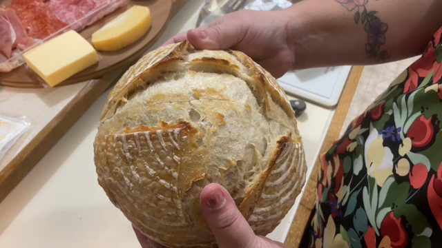 A video of the new golden brown sourdough being cracked open.