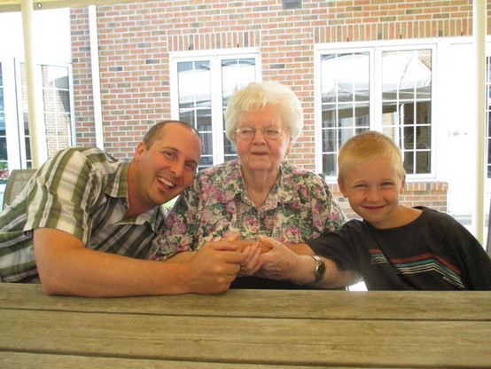 Me, Grandma, and her great grandson pose for a picture.