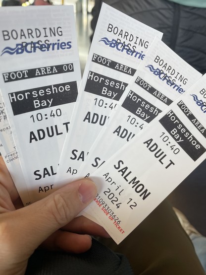 Four adult ferry boarding passes. The word of the day is Salmon.