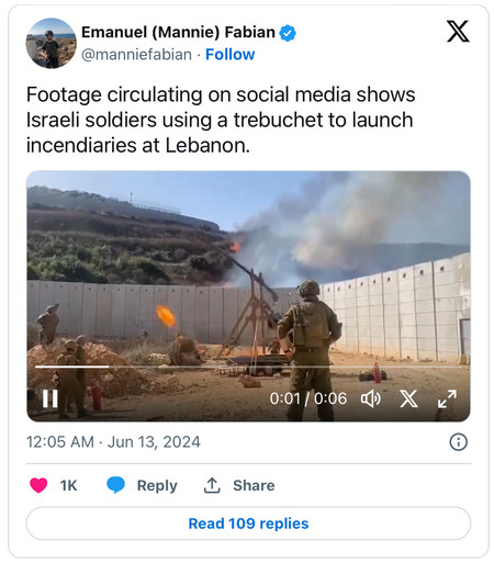 A screenshot from twitter from the account of @manniefabian showing a video of Israeli soldiers sending fireballs over a wall.